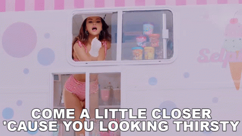 A Woman Is Looking Out Of An Ice Cream Truck With The Words Come A Little Closer Cause You Looking Thirsty Written Below GIF