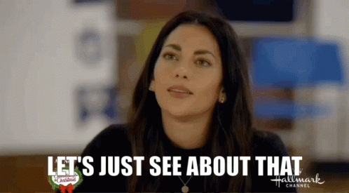A Woman Is Looking Up And Saying `` Let 'S Just See About That '' GIF