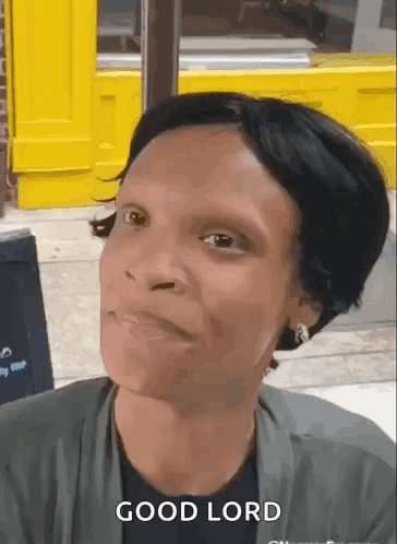 A Woman Is Making A Face And Says Good Lord GIF