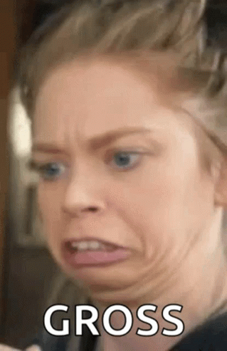 A Woman Is Making A Funny Face And Making A Funny Face With The Word Gross . GIF