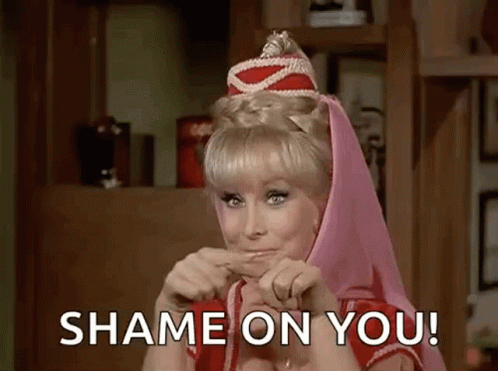 A Woman Is Making A Funny Face And Saying `` Shame On You ! '' GIF