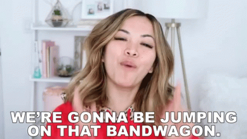 A Woman Is Making A Funny Face And Saying `` We 'Re Gonna Be Jumping On That Bandwagon . '' GIF