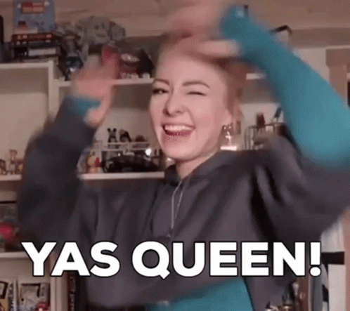 A Woman Is Making A Funny Face And Saying Yas Queen ! GIF