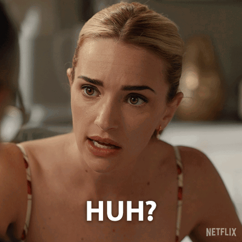 A Woman Is Making A Funny Face And The Words Huh Are On Her Face GIF