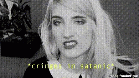 A Woman Is Making A Funny Face In A Black And White Photo With The Words `` Cringe In Satanic '' . GIF