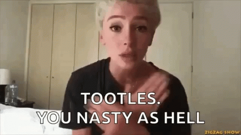 A Woman Is Making A Funny Face While Holding Her Chest And Saying Tootles . You Nasty As Hell . GIF