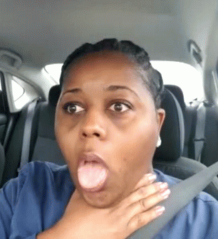 A Woman Is Making A Funny Face While Sitting In A Car With Her Hand On Her Neck . GIF