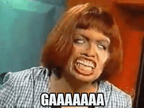 A Woman Is Making A Funny Face With The Words Gaaaaaa Written On Her Face GIF