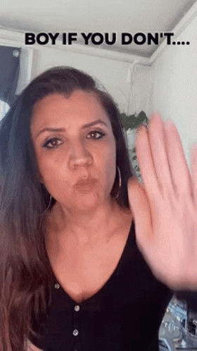 A Woman Is Making A Gesture With Her Hand And Says Boy If You Don 'T ... GIF