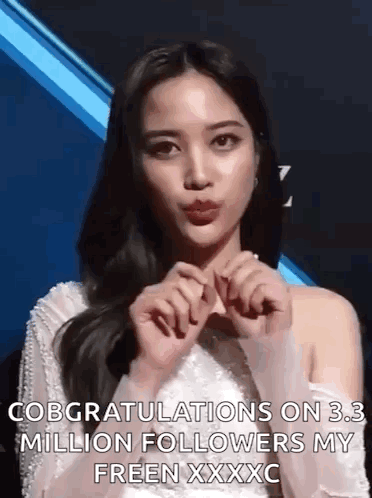 A Woman Is Making A Heart Shape With Her Hands And Says Congratulations On 3.3 Million Followers My Freen Xxxc . GIF