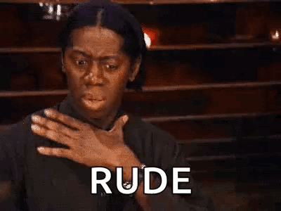 A Woman Is Making A Rude Gesture With Her Hands Over Her Chest . GIF