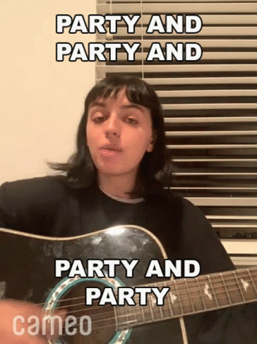 A Woman Is Playing A Guitar In Front Of A Window And Singing Party And Party And Party And Party . GIF