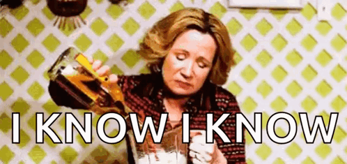 A Woman Is Pouring Beer Into A Glass With The Words `` I Know I Know '' Written Below Her . GIF