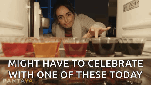 A Woman Is Reaching Into A Refrigerator With A Caption That Says Might Have To Celebrate GIF