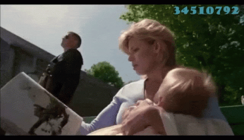 A Woman Is Reading A Book To A Baby With The Number 34510792 On The Bottom GIF