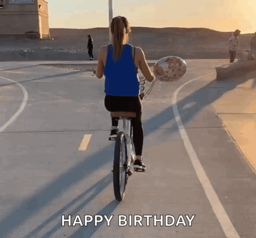 A Woman Is Riding A Bike While Holding A Balloon And The Words Happy Birthday Are Written On The Bottom GIF