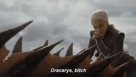 A Woman Is Riding On The Back Of A Dragon . GIF