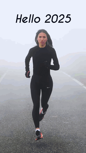 A Woman Is Running On A Road With The Words Hello 2025 Written On The Bottom GIF