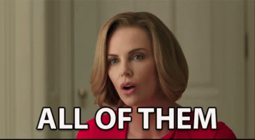 A Woman Is Saying " All Of Them " In A Red Shirt GIF