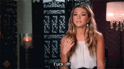 A Woman Is Saying " Fuck Off " While Sitting In A Chair GIF