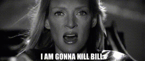 A Woman Is Saying I Am Gonna Kill Bill In A Black And White Photo GIF