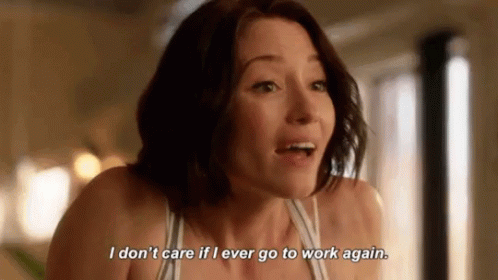 A Woman Is Saying " I Don 'T Care If I Ever Go To Work Again " GIF