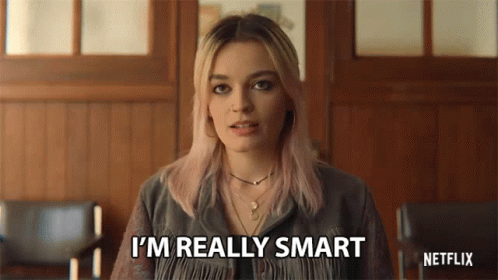 A Woman Is Saying I 'M Really Smart In Front Of A Netflix Logo . GIF