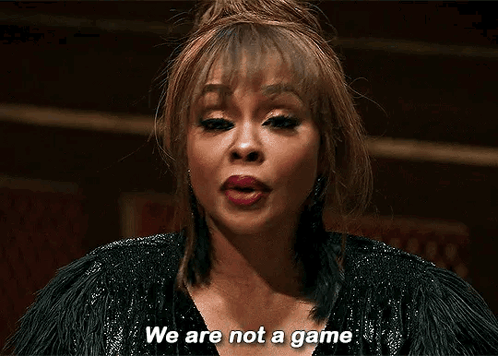 A Woman Is Saying We Are Not A Game In A Dark Room . GIF