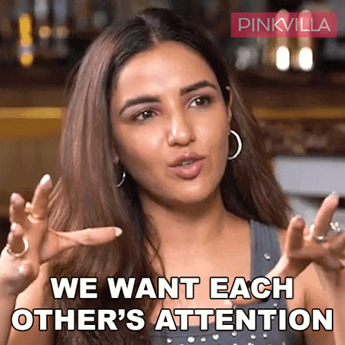 A Woman Is Saying " We Want Each Other 'S Attention " With Her Hands Outstretched GIF