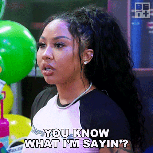 A Woman Is Saying You Know What I 'M Sayin ' In Front Of Balloons . GIF