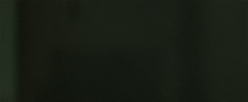 A Woman Is Screaming In A Dark Room GIF