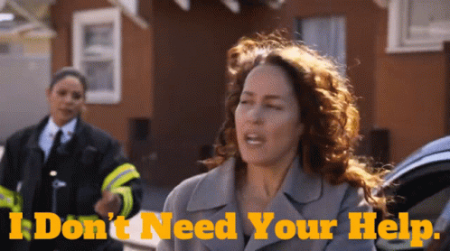 A Woman Is Screaming In Front Of A Sign That Says I Don T Need Your Help GIF