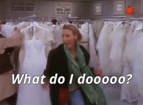A Woman Is Shopping For A Wedding Dress In A Store And Says `` What Do I Dooooo '' . GIF