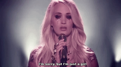 A Woman Is Singing Into A Microphone With Tears Running Down Her Face And Says I 'M Sorry GIF
