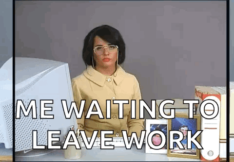 A Woman Is Sitting At A Desk In Front Of A Computer With The Words `` Me Waiting To Leave Work '' Written On It . GIF