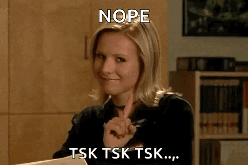 A Woman Is Sitting At A Desk With A Pen In Her Hand . GIF