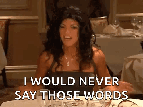 A Woman Is Sitting At A Table Saying I Would Never Say Those Words GIF