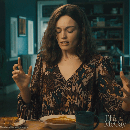A Woman Is Sitting At A Table With A Bowl Of Soup And A Cup Of Coffee And Says " No " GIF