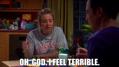 a woman is sitting at a table with a man and says `` oh god , i feel terrible . ''