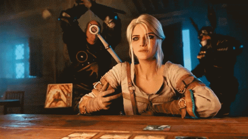 A Woman Is Sitting At A Table With A Sword And A Tarot Card GIF