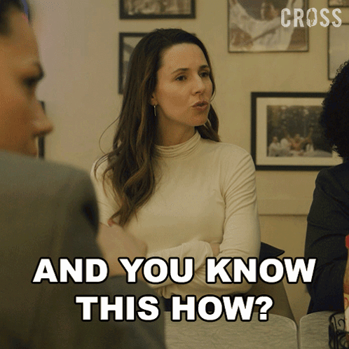 A Woman Is Sitting At A Table With Her Arms Crossed And The Words " And You Know This How " Next To Her GIF