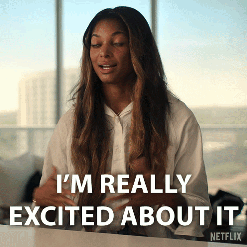 A Woman Is Sitting At A Table With Her Eyes Closed And The Words I 'M Really Excited About It Behind Her GIF
