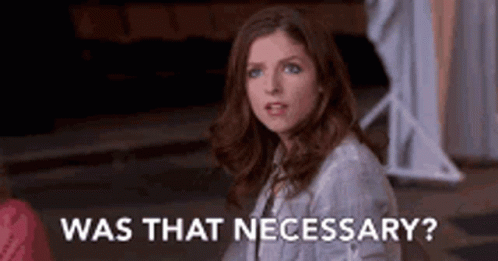 A Woman Is Sitting Down And Asking , `` Was That Necessary ? '' GIF