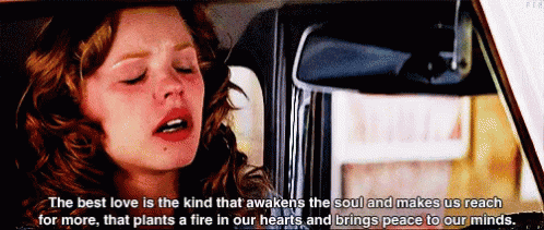 A Woman Is Sitting In A Car With Her Eyes Closed And A Quote About Love GIF
