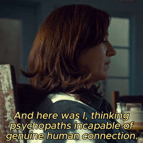 A Woman Is Sitting In A Chair With A Caption That Says And Here Was I GIF