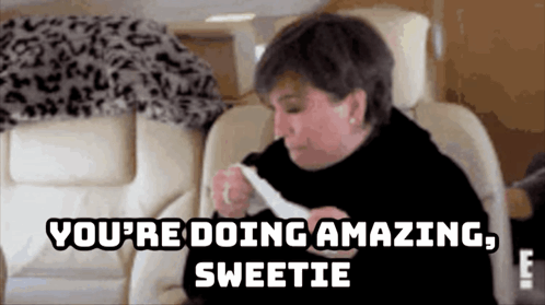 A Woman Is Sitting In A Chair With A Napkin In Her Hand And The Words `` You 'Re Doing Amazing Sweetie '' . GIF
