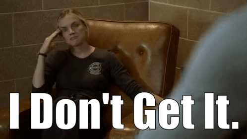 A Woman Is Sitting In A Chair With The Words " I Don 'T Get It " Written Below Her GIF
