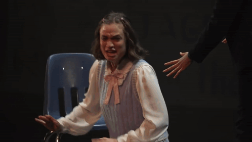 A Woman Is Sitting In A Chair With The Words " It 'S God 'S Plan " On The Bottom GIF