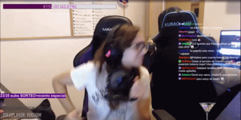 A Woman Is Sitting In A Gaming Chair With The Word Kurac On It GIF