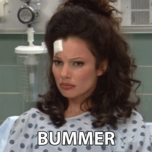 A Woman Is Sitting In A Hospital Bed With A Bandage On Her Head And The Words Bummer Written On The Bottom . GIF